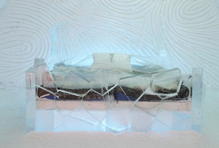 Bed in a frozen hotel room