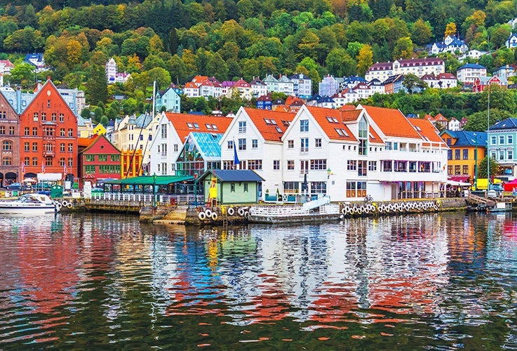 Red roofed buildings in Bergen overlooking water