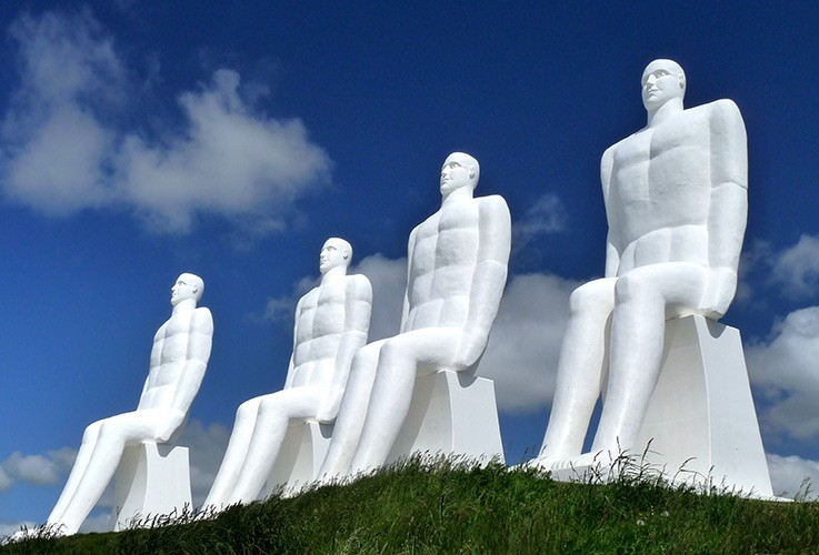 Row of large statues of men