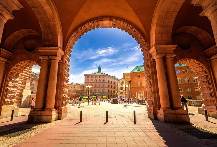 Looking out at city through arches in Copenhagen